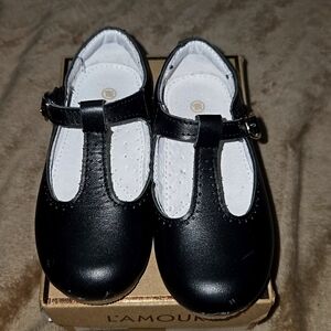 Very cute toddler girl T-strap flat,worn two times.